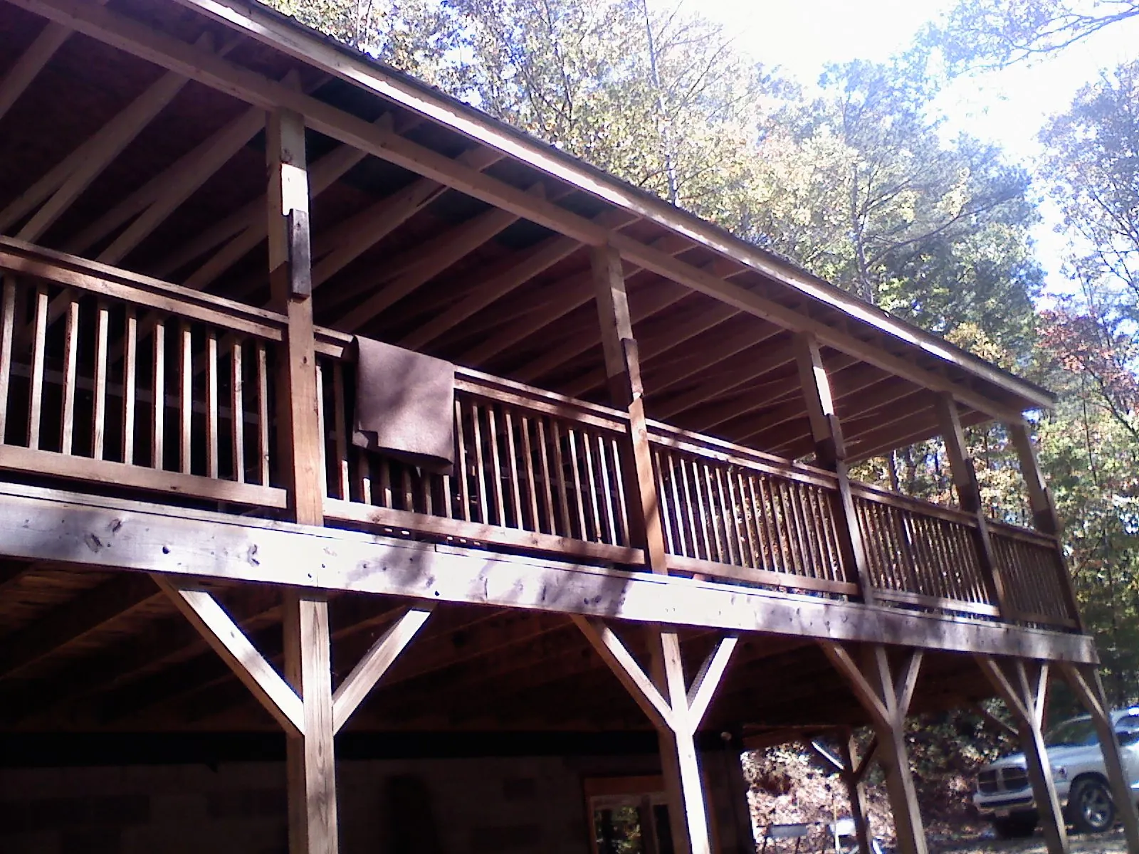 Timber framing under a new elevated porch and deck — Roof Leak Repair in Valencia by Roofing Brothers